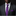 Man wearing a black suit with a purple tie and pocket square against a dark background