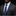 Man wearing a gray suit with a blue striped tie and pocket square on a black background