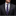 Man wearing a dark suit with a plaid tie and pocket square on a black background