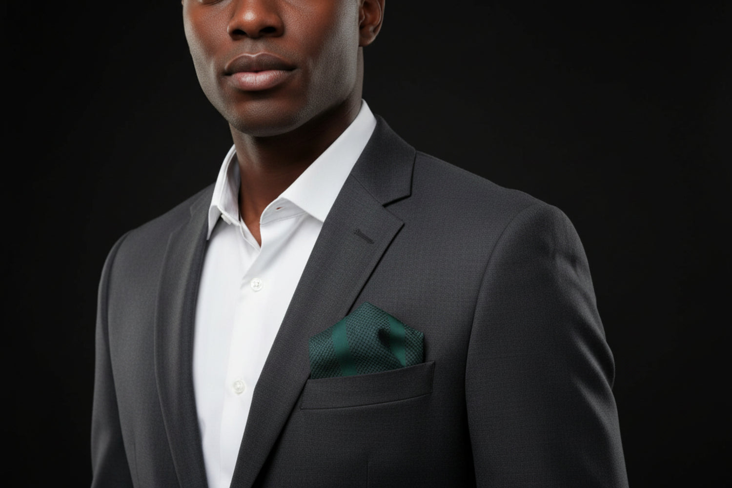 Man wearing green pocket square with nice suit