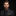 Man wearing a black suit with a grey and gold pocket square on a black background