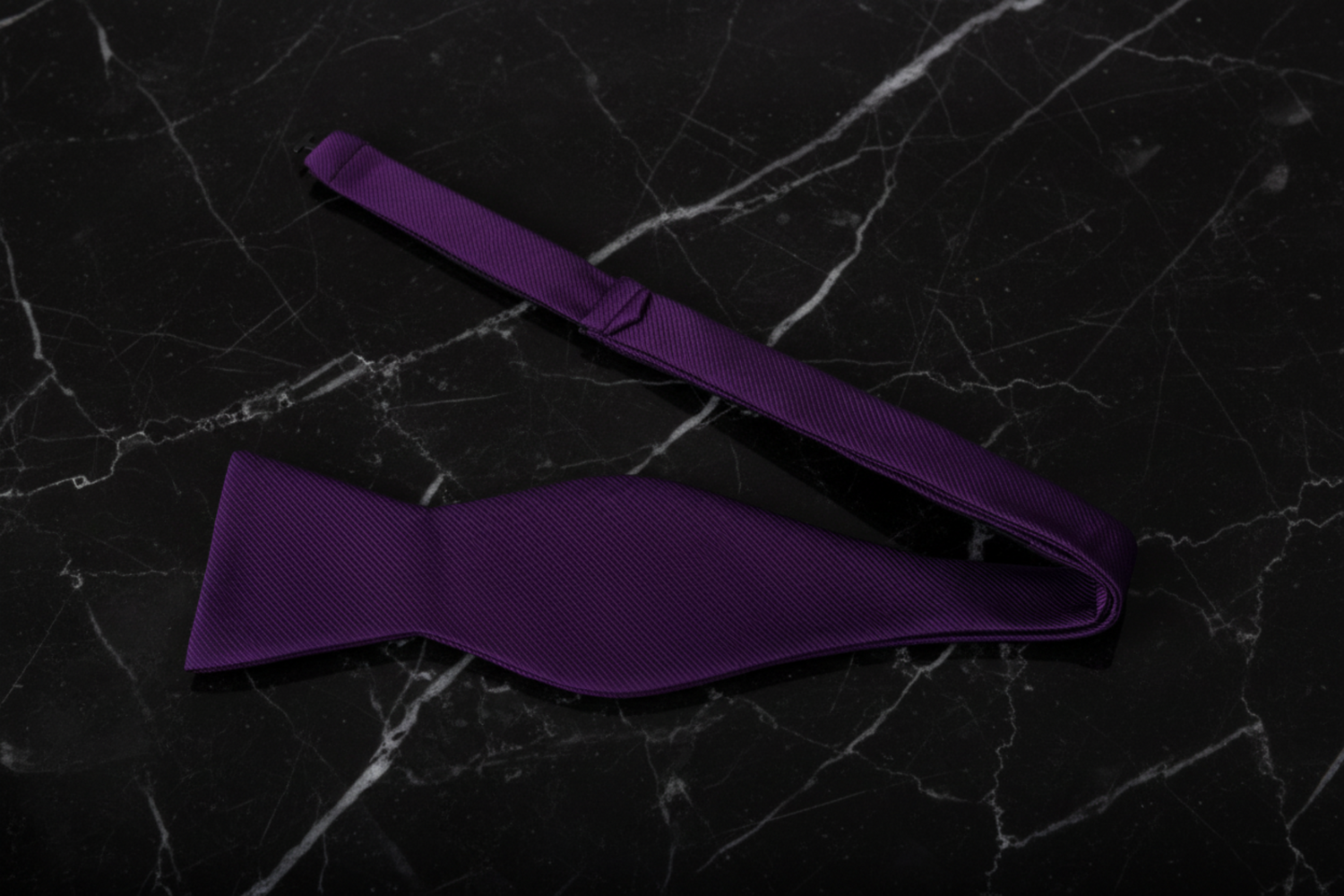 A Purple Solid Pattern Self Tie Bow Tie