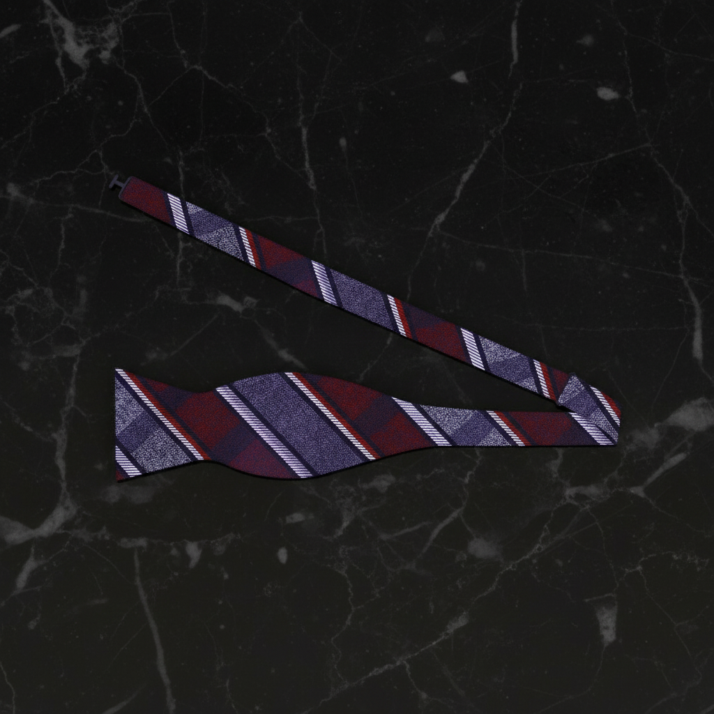 Striped bow tie on a dark marble background