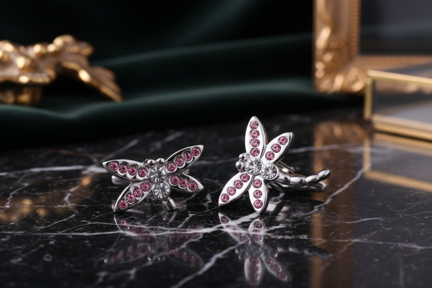 a pair of chrome dragonfly cufflinks
