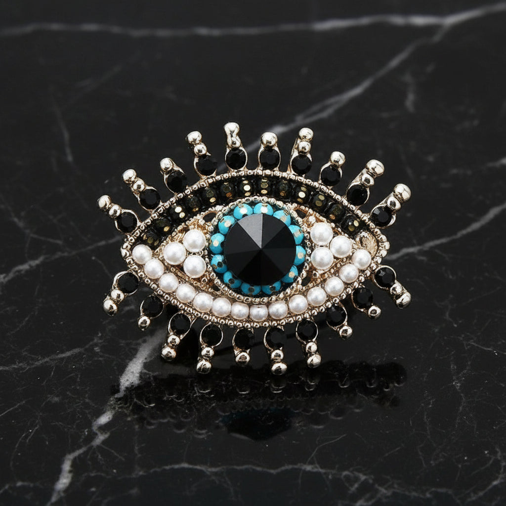 Eye Lapel Pin with Black Stones