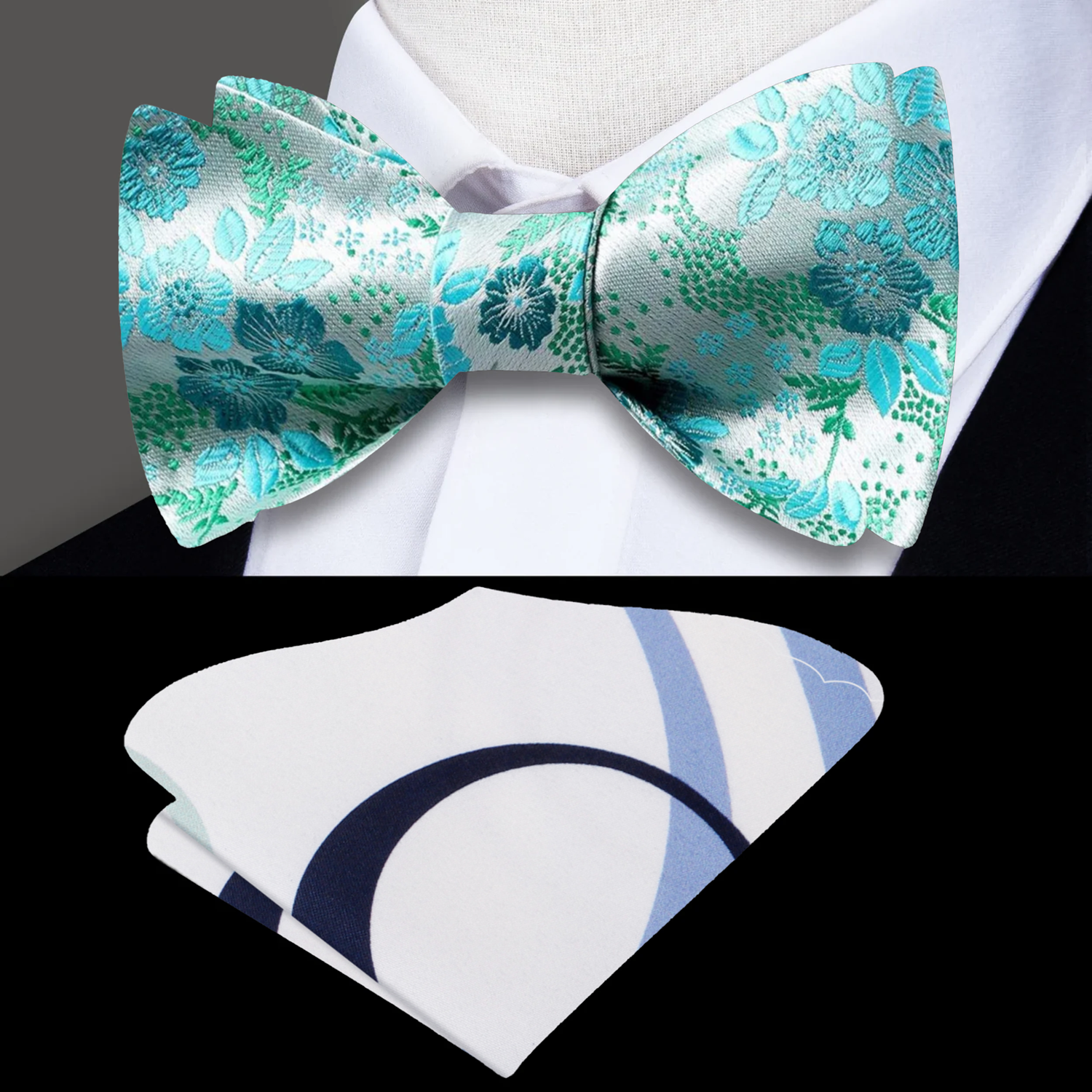 A floral bow tie with a combination of light teal, green, and blue colors laid out on a flat surface with a pink rose in the background.