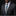 Man wearing a dark gray suit with a colorful paisley tie and pocket square on a black background