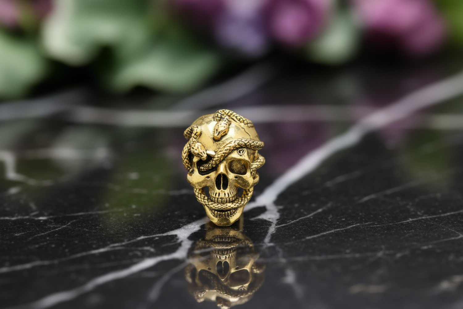 Main Gold Colored Skull and Snake Lapel Pin