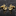gold cufflinks that are anchors with a rope