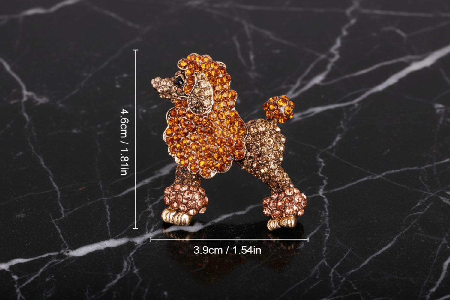 Brown poodle-shaped brooch with gemstones and measurements on a white background