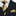 A Gold and Black Stripe and Paisley Tie and Square