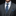 Gray suit with a patterned blue tie and pocket square on a black background