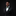 Man wearing a black suit with a green patterned bow tie and pocket square on a black background