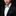 Man wearing a black suit with a green bow tie against a black background
