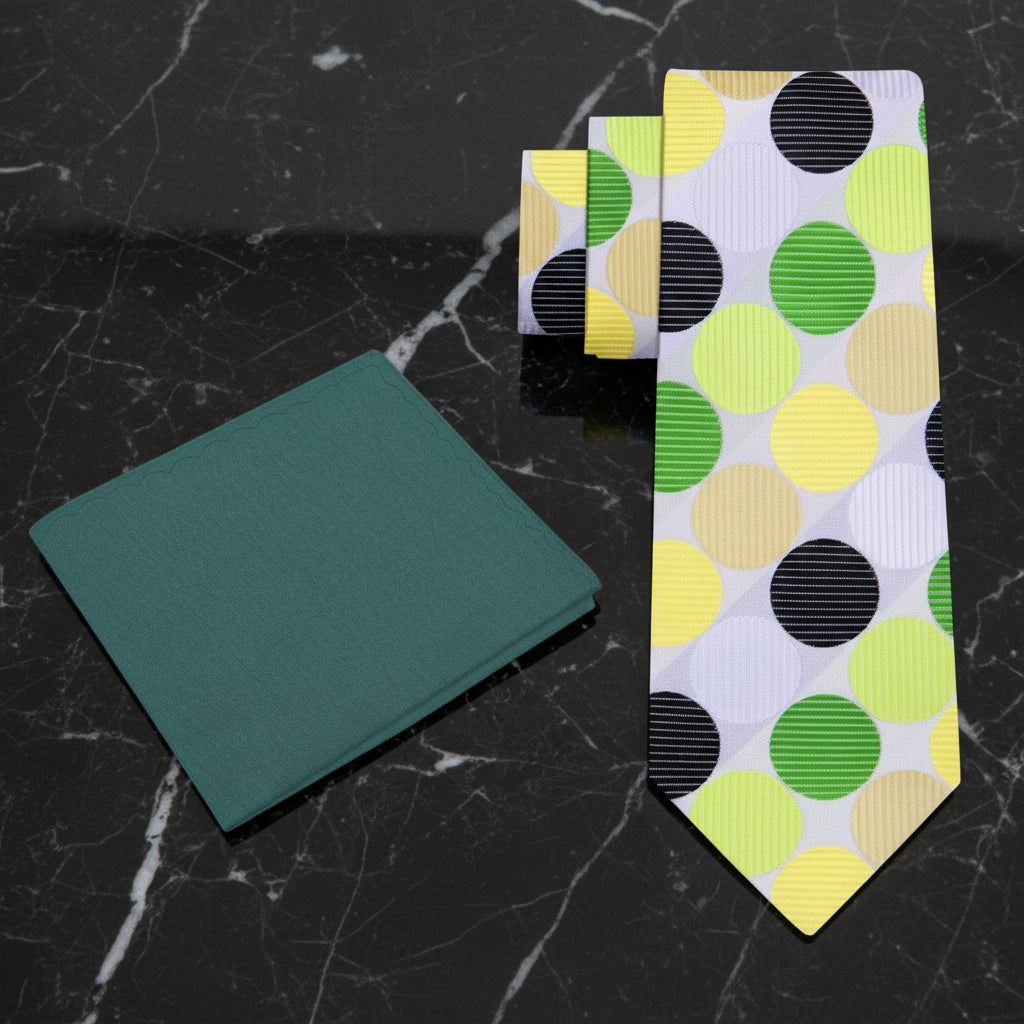 Green pocket square and necktie with colorful dot pattern on a white background
