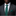 Man wearing a gray suit with a green polka dot tie and pocket square on a black background