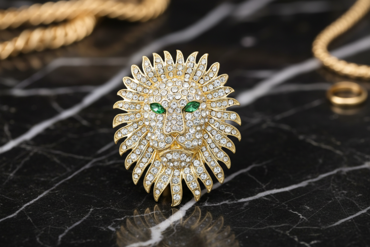 a gold lion with green eyes lapel pin