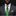 Man wearing a gray suit with a green tie and patterned pocket square on a black background