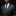 Man wearing a gray suit with a green tie and pocket square on a black background