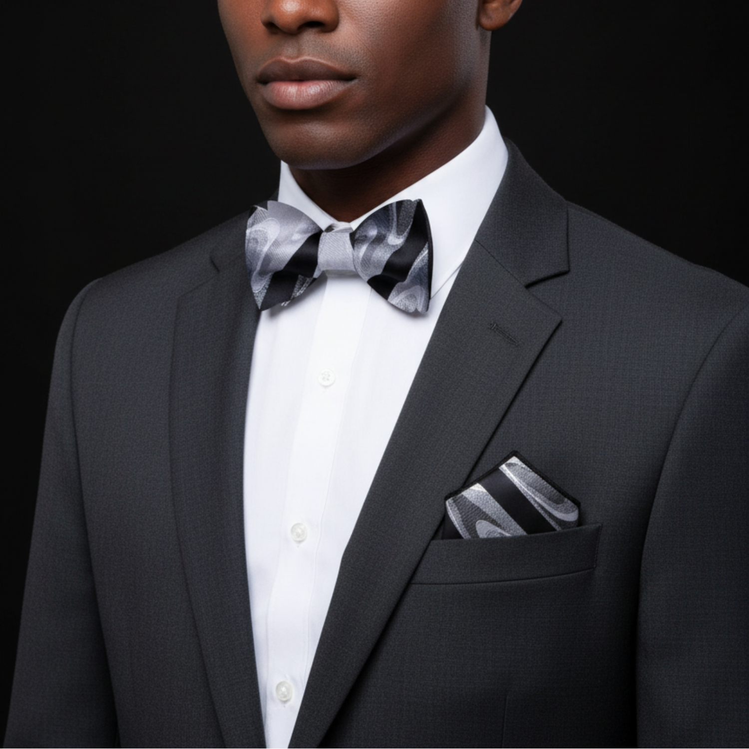 Man wearing Grey, Black Stripe and Waves Bow Tie and Pocket Square