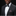 Man wearing a gray suit with a patterned bow tie and pocket square on a black background