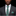 Man wearing a dark gray suit with a green and gray plaid tie and pocket square on a black background