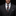 A close-up of a man wearing a dark gray three-piece suit, white dress shirt, and a patterned necktie with teal, orange, and gray paisley and stripe details. A matching pocket square is tucked into the suit jacket's breast pocket against a solid black background.