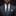 Man wearing a dark suit with a plaid tie and pocket square on a black background
