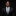 Man wearing a black suit with a patterned tie against a dark background