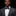 Man wearing grey and pink floral bow tie and matching square