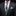 Man wearing a gray suit with a plaid tie and patterned pocket square on a black background
