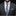 Man wearing a gray suit with a plaid tie and pocket square on a black background