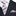 Navy suit with a striped charcoal and pink tie and matching pocket square on a white background