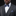 Man wearing a gray suit with a blue bow tie and pocket square on a black background