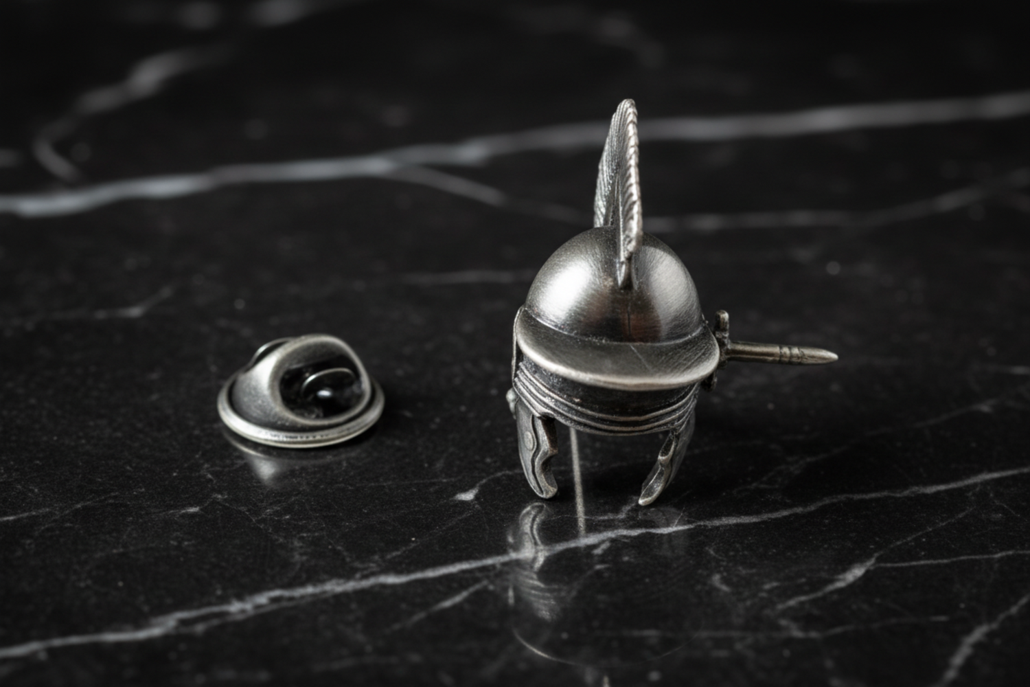 a small lapel pin helmet