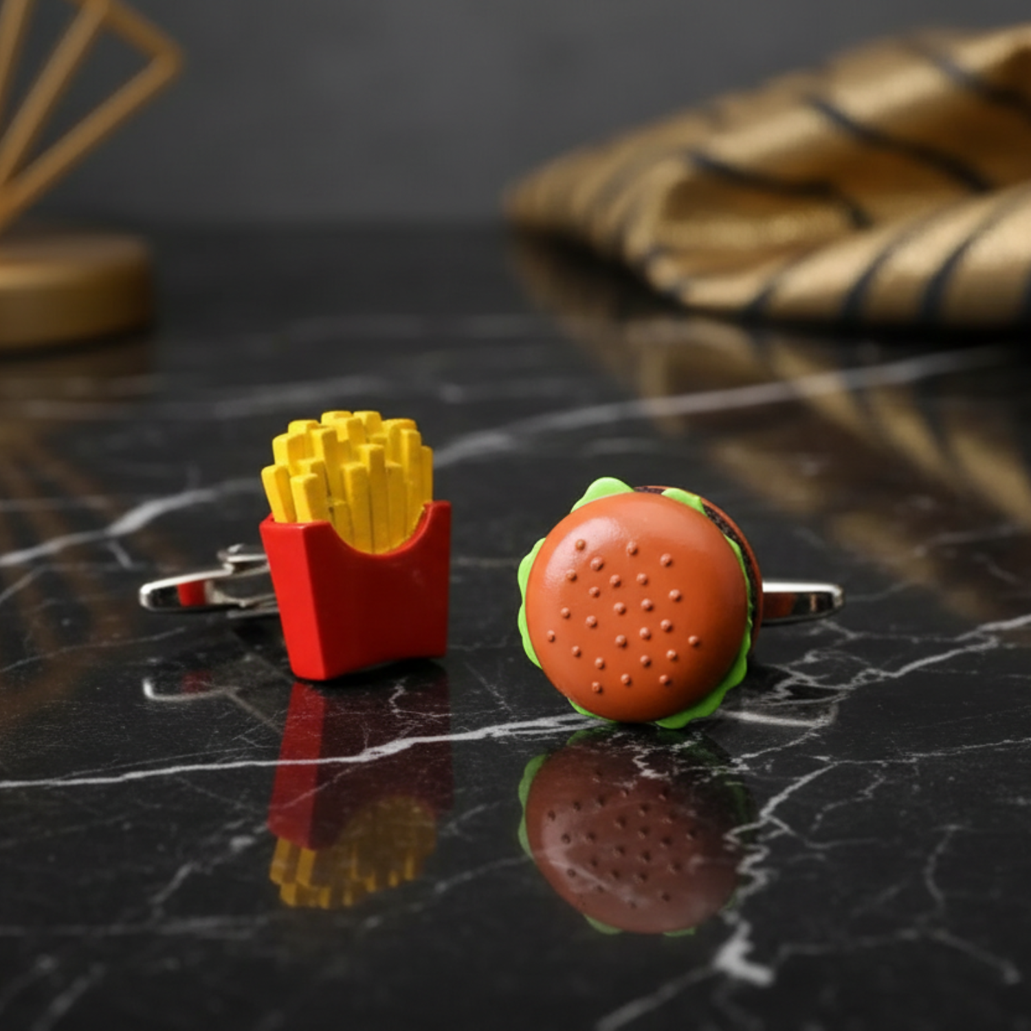 a pair of small hamburger and fries cufflinks