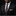 Man wearing a black suit with a patterned tie and white shirt on a black background
