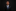 Young boy in a black suit with a blue tie and pocket square on a black background