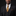 Man wearing nice black suit with brown and gold big paisley tie and square