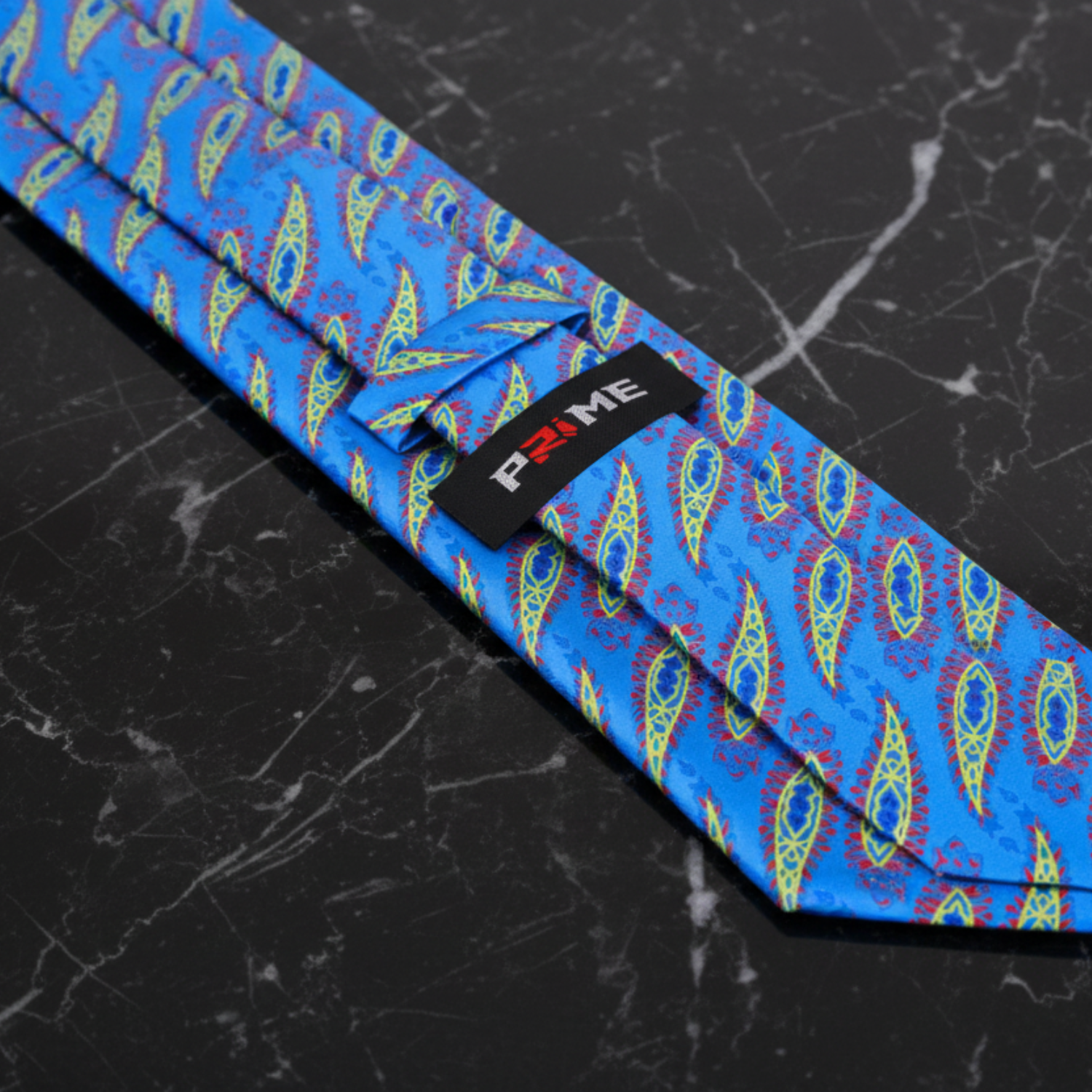 Blue patterned tie with a brand tag 