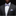 Man wearing a gray suit with a white shirt, patterned bow tie, and pocket square on a black background