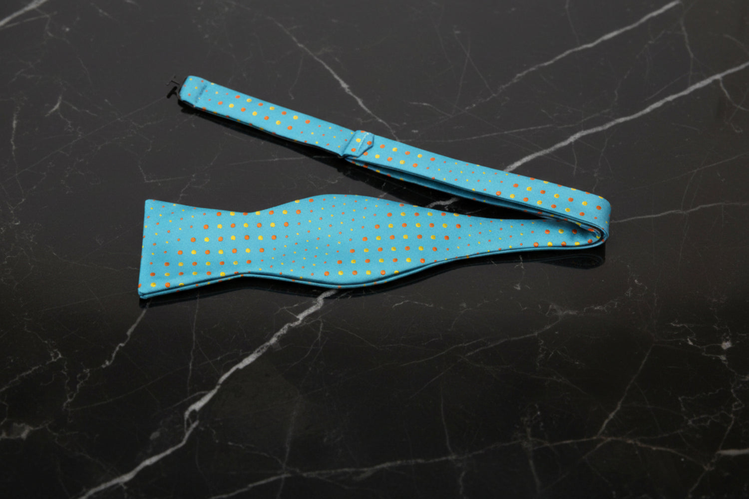 United A Light Blue, Yellow, Orange Polka Pattern Self Tie Bow Tie