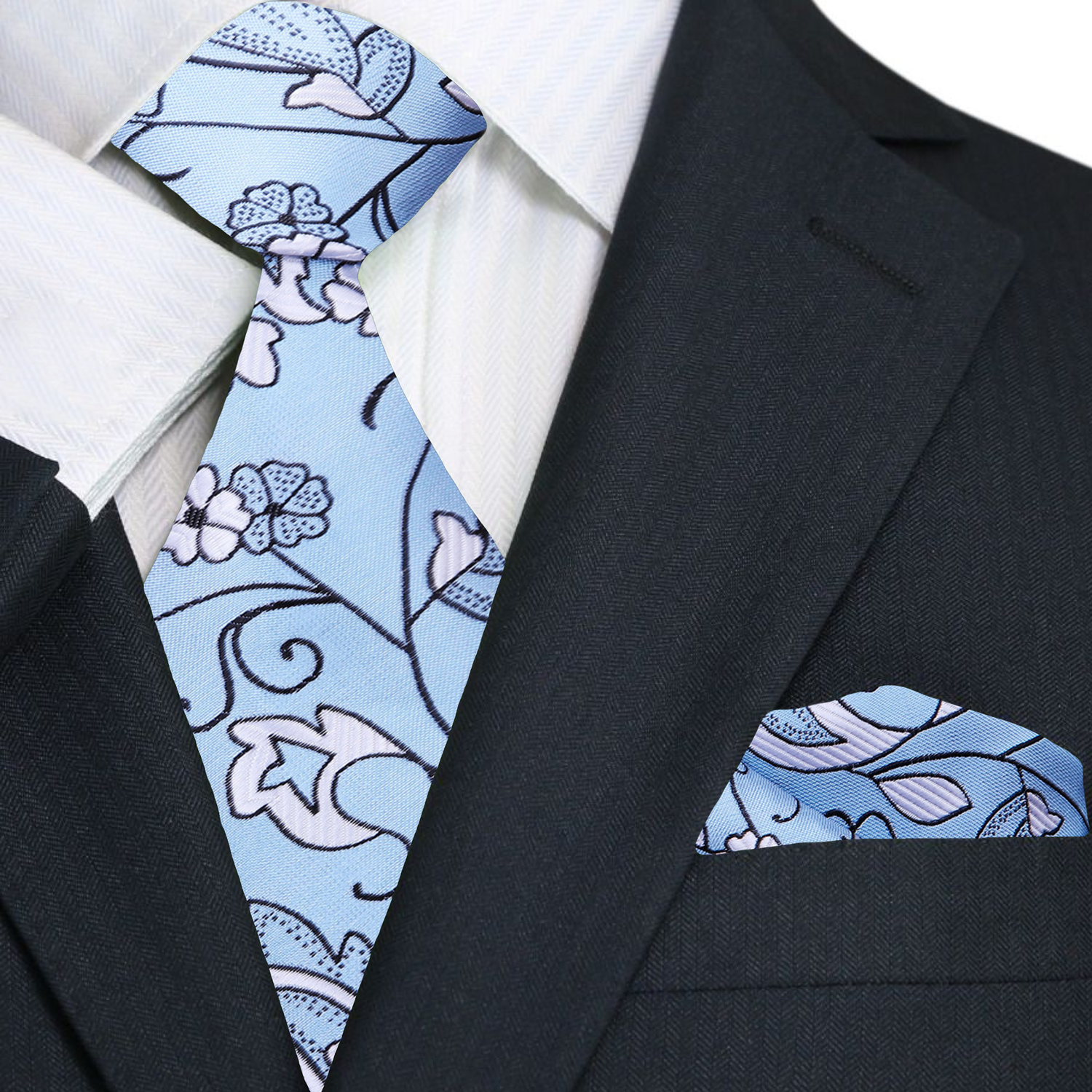 Blue floral tie and pocket square set on a black suit jacket.
