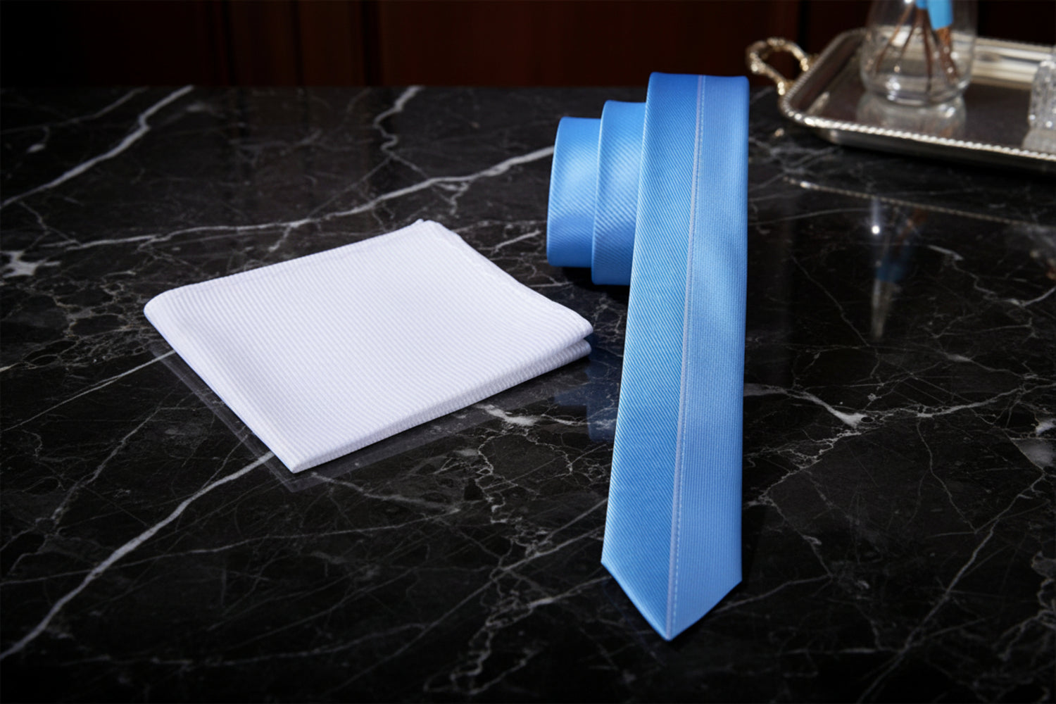 Thin blue tie and white square