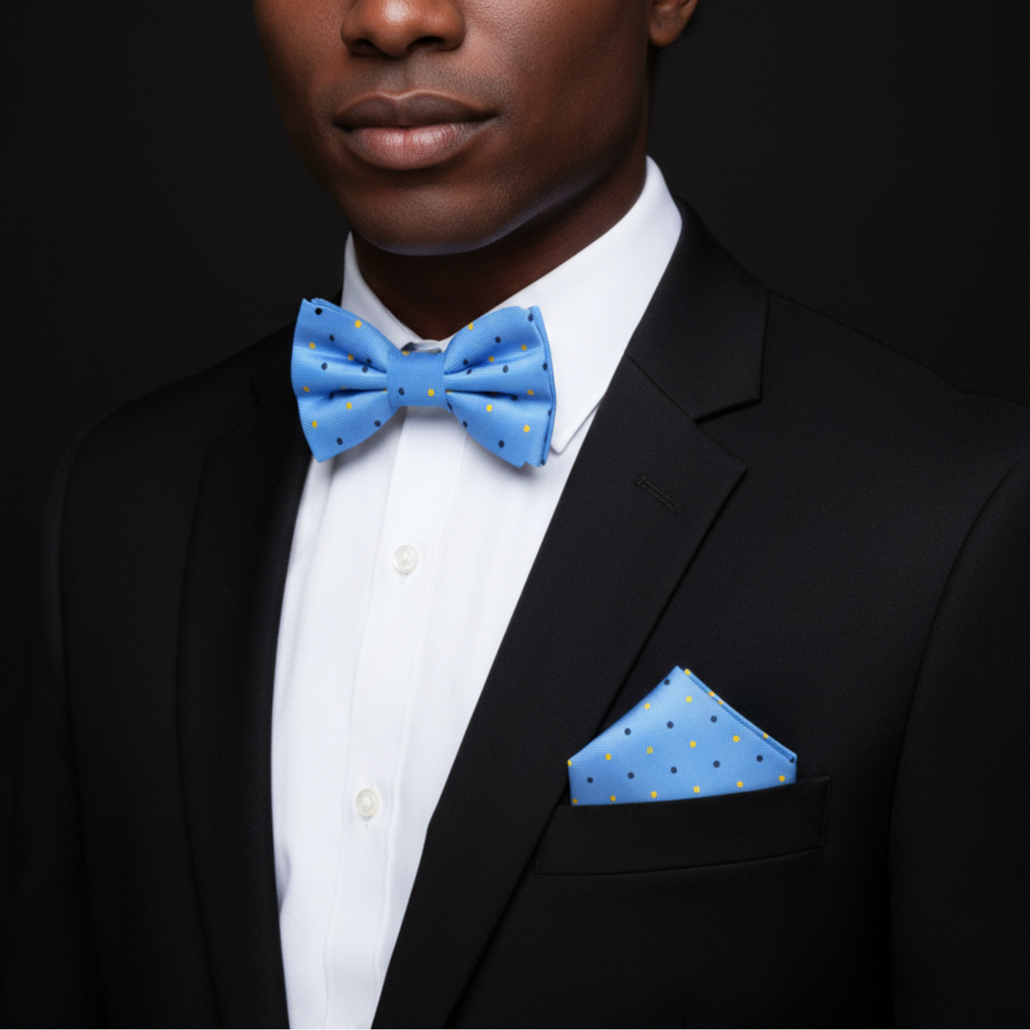Light Blue with yellow and dark blue dots bow tie and square on man
