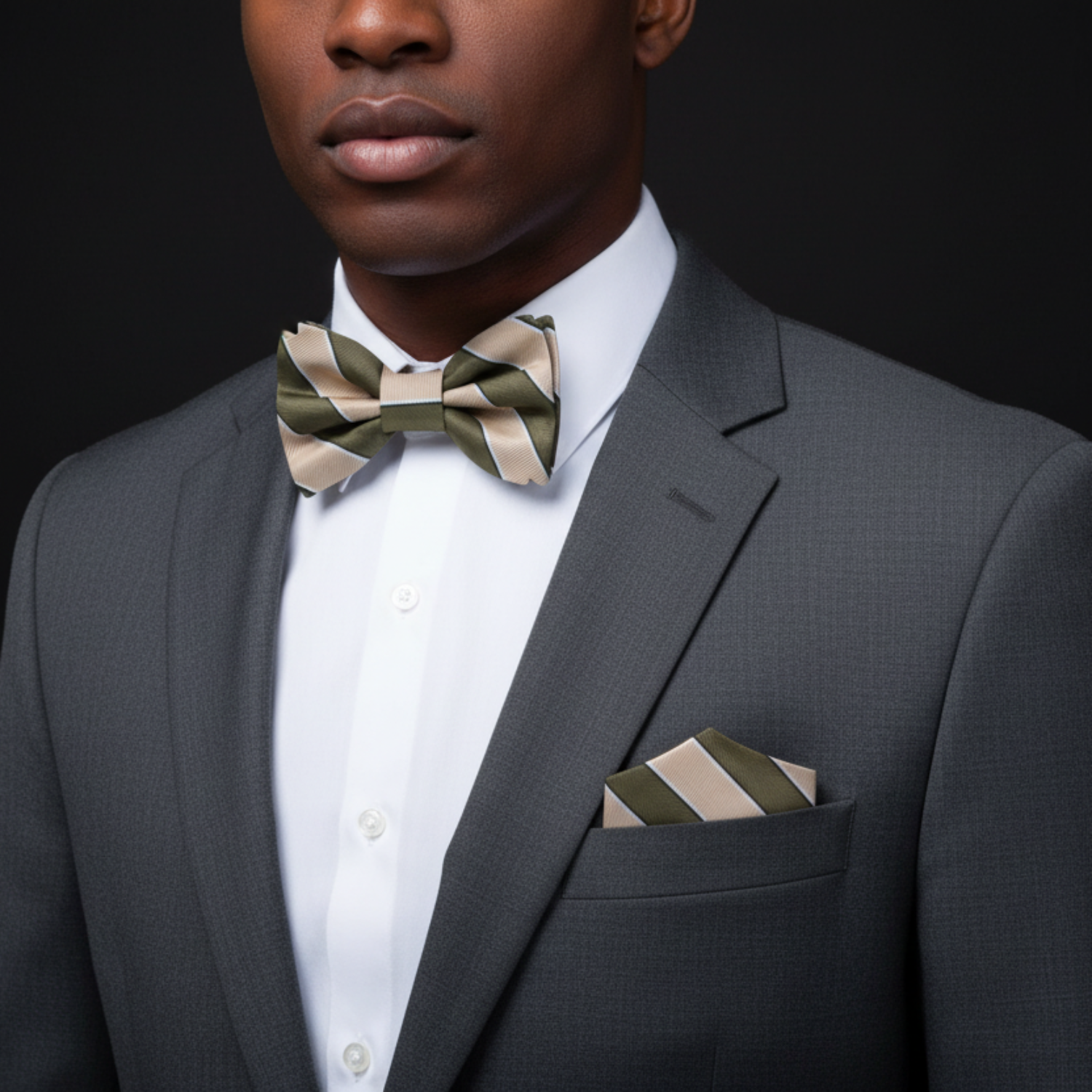 Man wearing beige and olive stripe bow tie and square