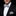 Man wearing white black paisley bow tie and square
