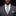 Man wearing a gray suit with a checkered tie and pocket square on a black background