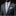 Man wearing a gray suit with a patterned tie and pocket square on a black background