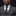 Man wearing a gray suit with a patterned tie and pocket square on a black background